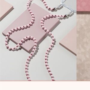 OSSA NEW YORK crossbody beaded phone chain